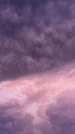 Storm clouds on the eve of a thunderstorm, purple clouds in cloudy weather. newの写真素材