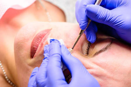 Mechanical cleansing of the face with a spoon uno, removing grease and blackheads. newの写真素材