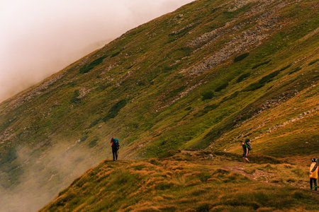 Tourists and mountains of the Montenegrin ridge, endless landscapes and the silence of the...