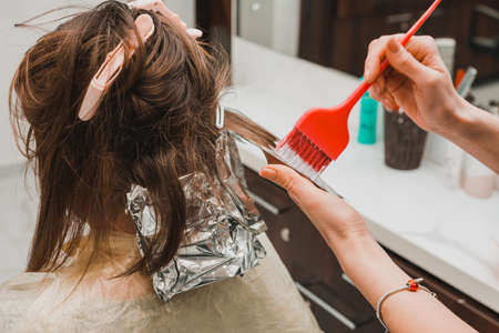 Beginning of hair coloring, coloring technique balayag, hair bleaching for applying paint. newの写真素材