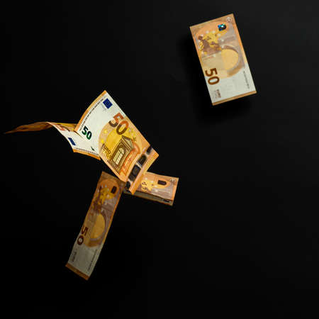 Rain with euros, European currency on a black background, winning the lottery. newの写真素材