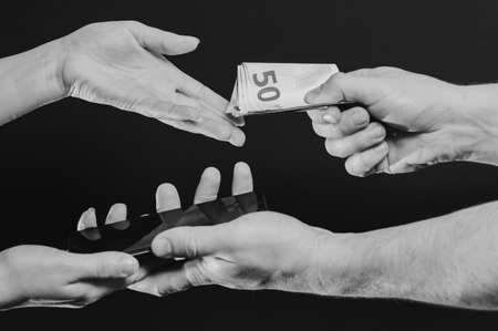 Sale and purchase of a mobile phone, retail, payment for goods in cash in euros. newの写真素材