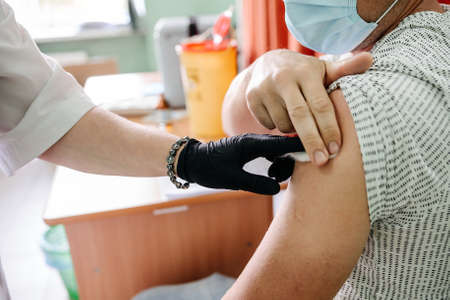Immunization process, vaccination room in Ukraine, protection of the immune system by vaccination,...