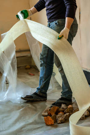 Damping tape to improve the quality and durability of floor screed, a novelty in construction, repair in a private house.の写真素材