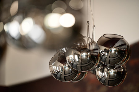 Decorative chandelier hanging from the ceiling, decoration of any house, chandelier with light bulbs.の写真素材