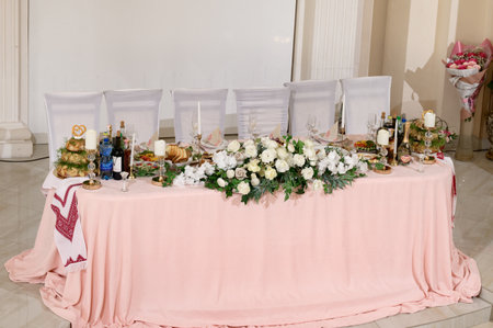 City of Dolyna, Ukraine June 27, 2021: Decorated wedding hall, served tables and dishes, round tables and a bright hall, weddings in Ukraine.のeditorial素材
