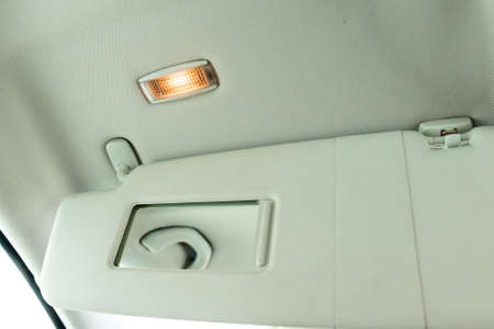 Sun visors for the car interior with a new sliding mirror and lighting.の写真素材