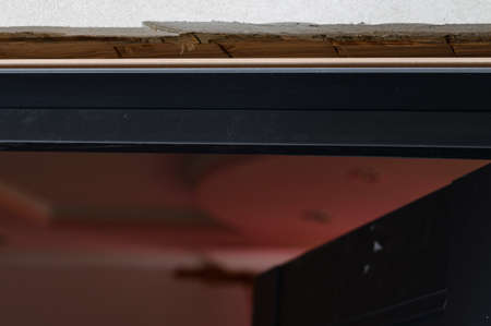 Fragments of the doorway and door frame, installation of interior doors, the opening between the...