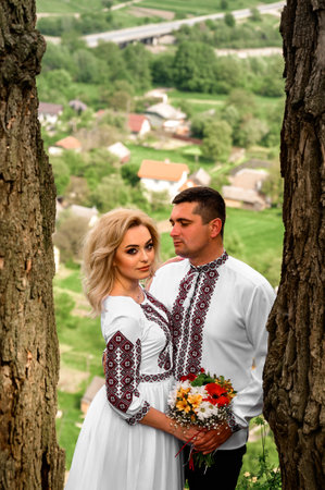Ivano-Frankivsk, Ukraine May 25, 2021: a portrait of a couple in love in Ukrainian national clothes, Vyshyvantsi, bridal walkのeditorial素材