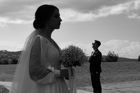 Ivano-Frankivsk, Ukraine June 26, 2021:A walk of the bride and groom after the wedding ceremony, wedding portrait of a couple, black and white photoのeditorial素材