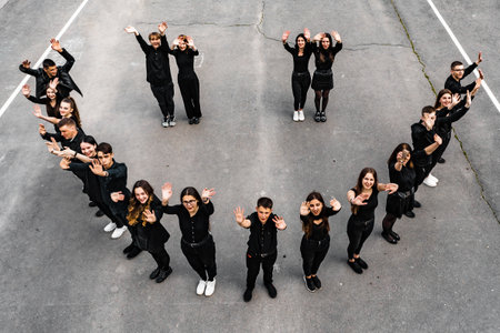 Ivano-Frankivsk, Ukraine May 15, 2021: photo of students who made a smiley in the schoolyard,...
