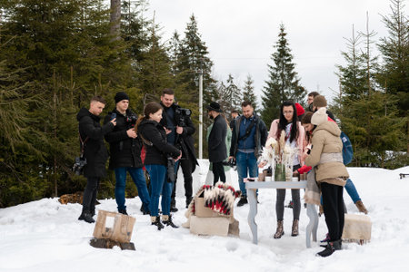 Vorokhta, Ukraine March 31, 2021: a group of photographers in training, training of professional photographers in Ukraine.のeditorial素材