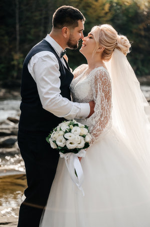 Ivano-Frankivsk, Ukraine October 2, 2021: bridal walk in the autumn mountains, a walk by the river.のeditorial素材