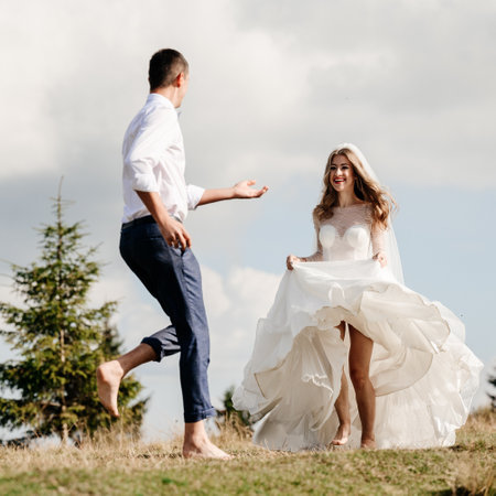 Ivano-Frankivsk, Ukraine September 30, 2021: bridal walk in the autumn park, Ukrainian bride and groom.のeditorial素材
