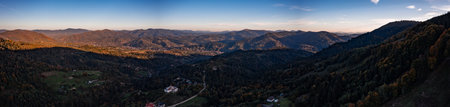 Panorama of a village in the mountains in the shadow of the mountains, landscape view with a village.の写真素材