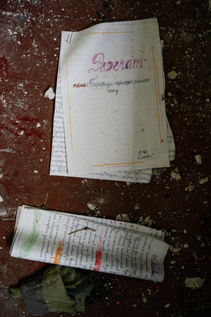 Kyiv, Ukraine July 1, 2022: an essay on terrorism, war in Ukraine lies on the floor in an abandoned school.のeditorial素材
