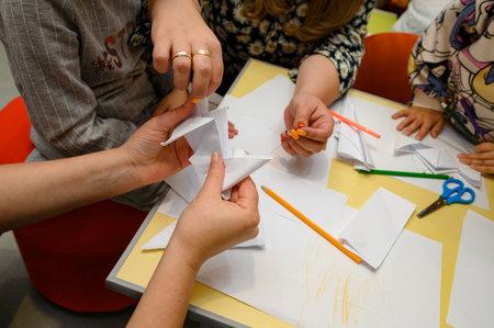 Ivano-Frankivsk, Ukraine, October 2, 2022: opening day of a kindergarten for preschoolers, children with their parents at the first lesson, Ukrainian private kindergarten.のeditorial素材