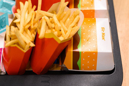 Ivano-Frankivsk, Ukraine, June 7, 2023: prepared and packaged Big Mac menu on the table of visitors to McDonalds.のeditorial素材