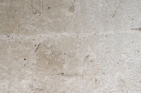 The background of an old wall decorated with gray cement sand mortar