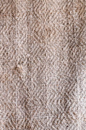 Background of old bag sacking with texture of knitted thread