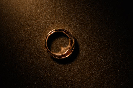 Wedding rings for weddings and marriages, gold rings for brides on a dark background.の写真素材