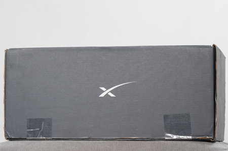 Ivano-Frankivsk, Ukraine December 2, 2023: Starlink antenna box with logo, Elon Musk space company.