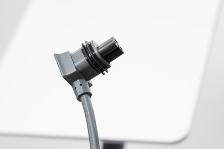 Ivano-Frankivsk, Ukraine December 2, 2023: adapter cable for Starlink satellite antenna on a white background.のeditorial素材