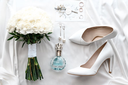 Ivano-Frankivsk, Ukraine September 8, 2023: Details of the bride on a white background.のeditorial素材