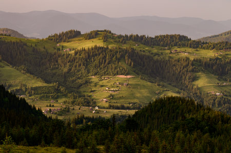 Picturesque views of the Carpathians and the village, wallpapers on the theme of mountains and the village, a journey through the mountains.の写真素材