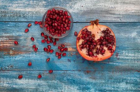 Pomegranate on vintege blue backgroundの写真素材