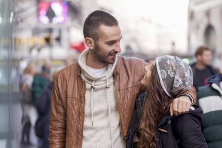Young couple in love in the city walksの写真素材