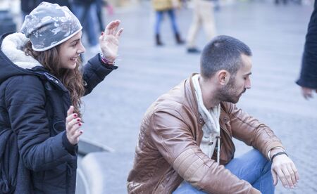 Young couple in love in the city walksの写真素材