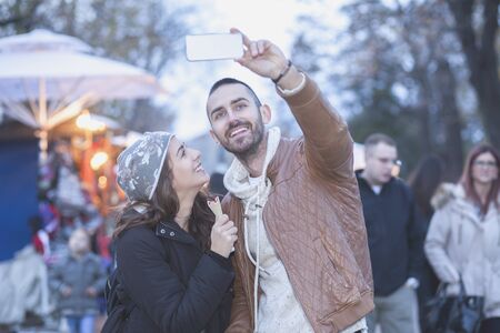 Young couple in love in the city walkの写真素材