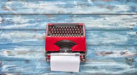 Journalists single Equipment. Old typewriter and crumpled paper on the vintage background. The old conceptの写真素材