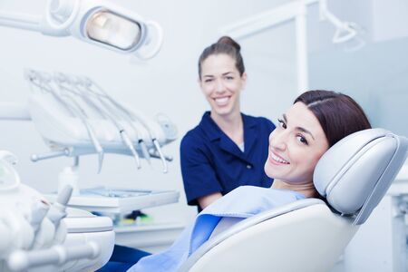 Woman visiting her dentistの写真素材