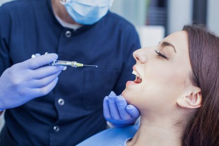 Woman visiting her dentistの写真素材
