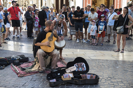 Avignon ( France ) 07/26/2016: during the festival period in Avignon ( France ) streets are full of...