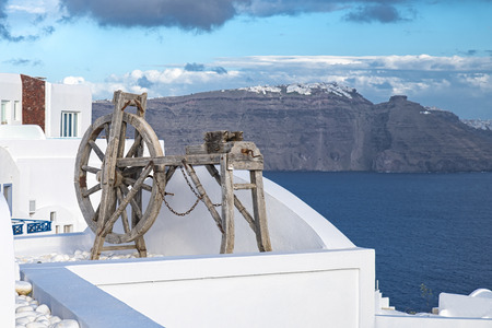 Spinning wheel in Santoriniの写真素材