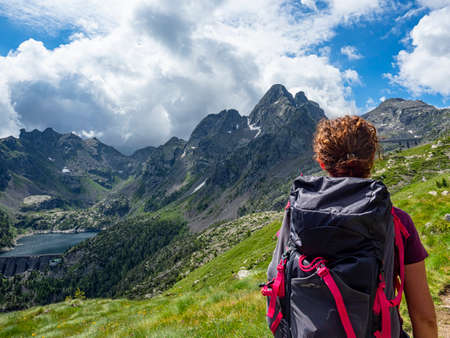 Trekking woman in the italian alpsの写真素材