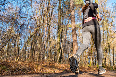 Jogging scene in a woodland