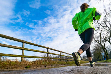 Running on a muddy trail