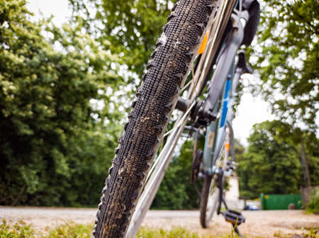 Mountain bike tire close-up with dirt