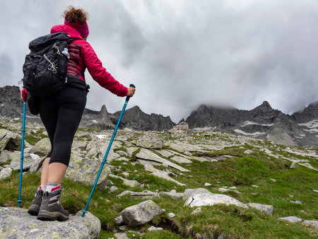 Trekking scene in the italian alps of Val Masinoの写真素材