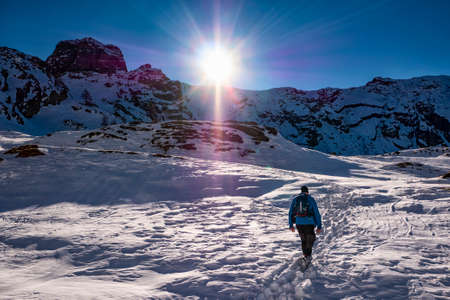 Winter trekking in the alps of Valsassinaの写真素材
