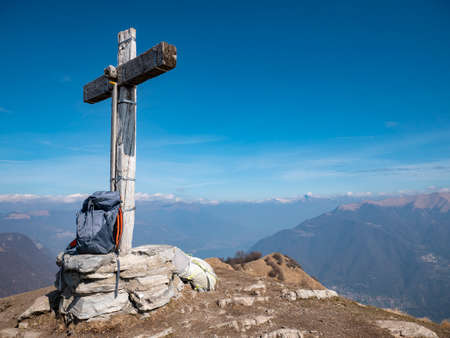 Wood cross on the peak of Mount Colmegnone in Valle Intelviの写真素材