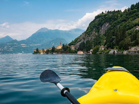 Visiting Lake Como on a canoeの写真素材