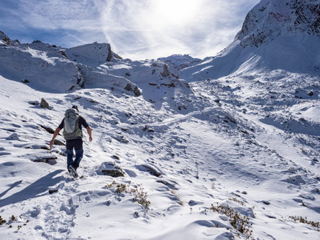 Trekking scene in winter on the italian alpsの写真素材