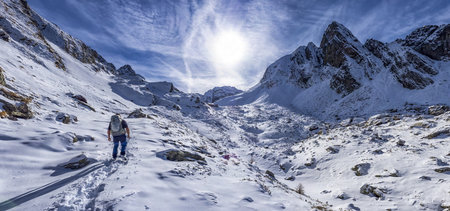 Trekking scene in winter on the italian alpsの写真素材