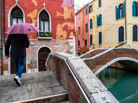 Typical alley of Venice in a rainy dayの写真素材