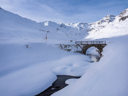 Snowy landscape in the alps of Montesplugaの写真素材